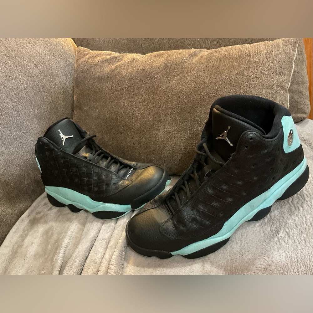Nike Air Jordan: men’s size 10.5  black retro island green high top sneakers.